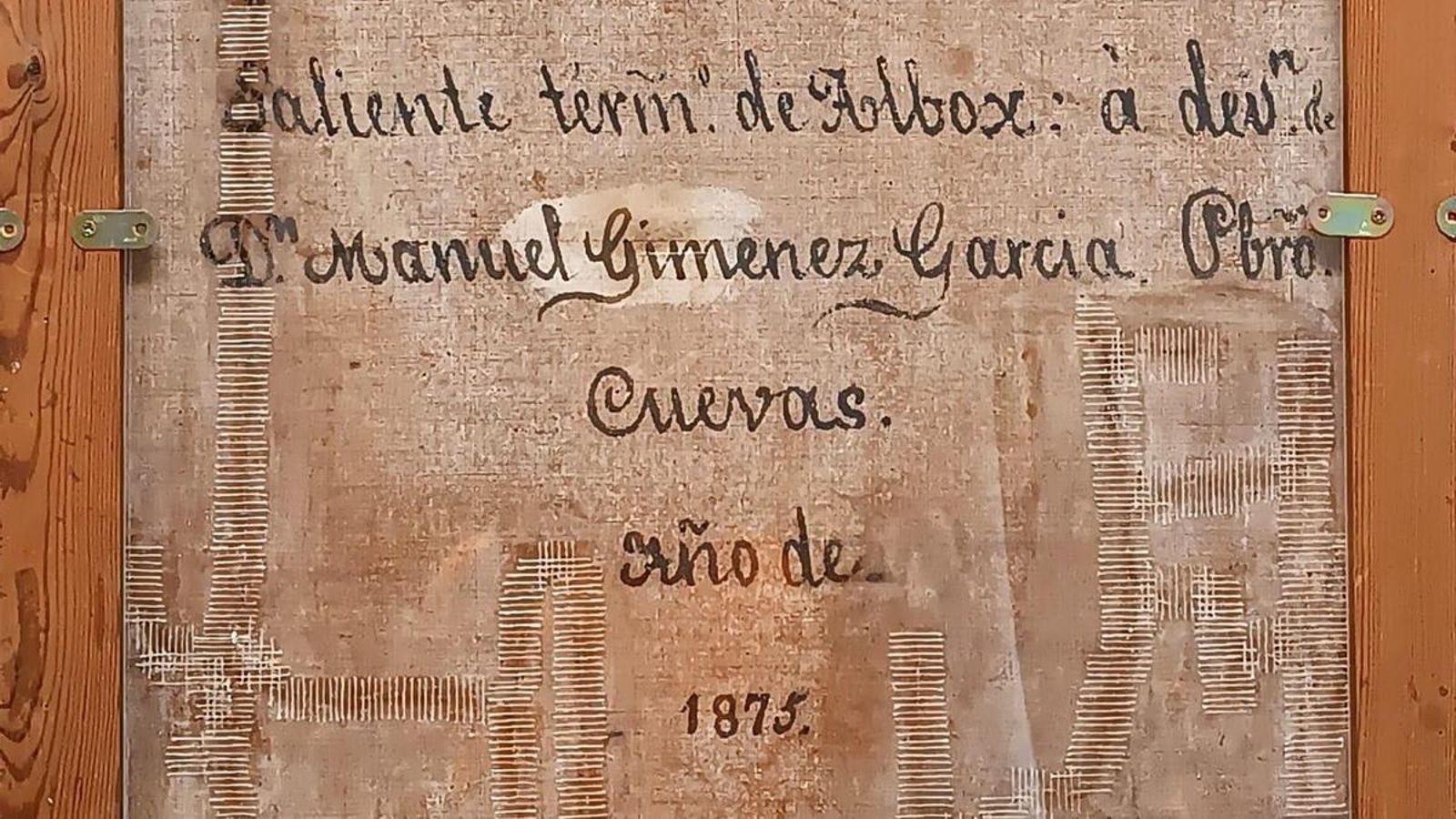 Tras quitar la tabla se descubrió la inscripción de Manuel Giménez en 1875