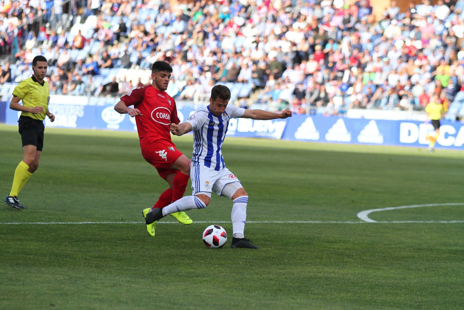 Imágenes del encuentro entre el Recreativo de Huelva y el San Fernando