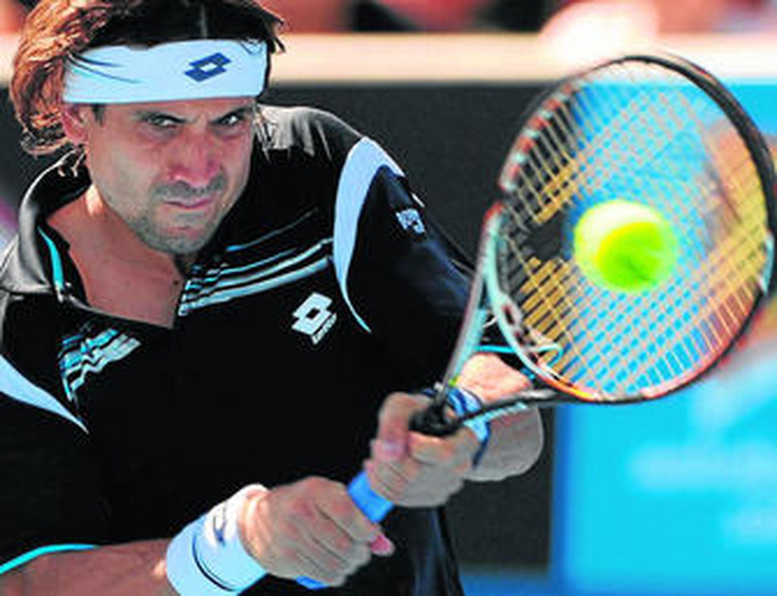 David Ferrer devuelve con furia de revés un golpe ante el estadounidense Sweeting.