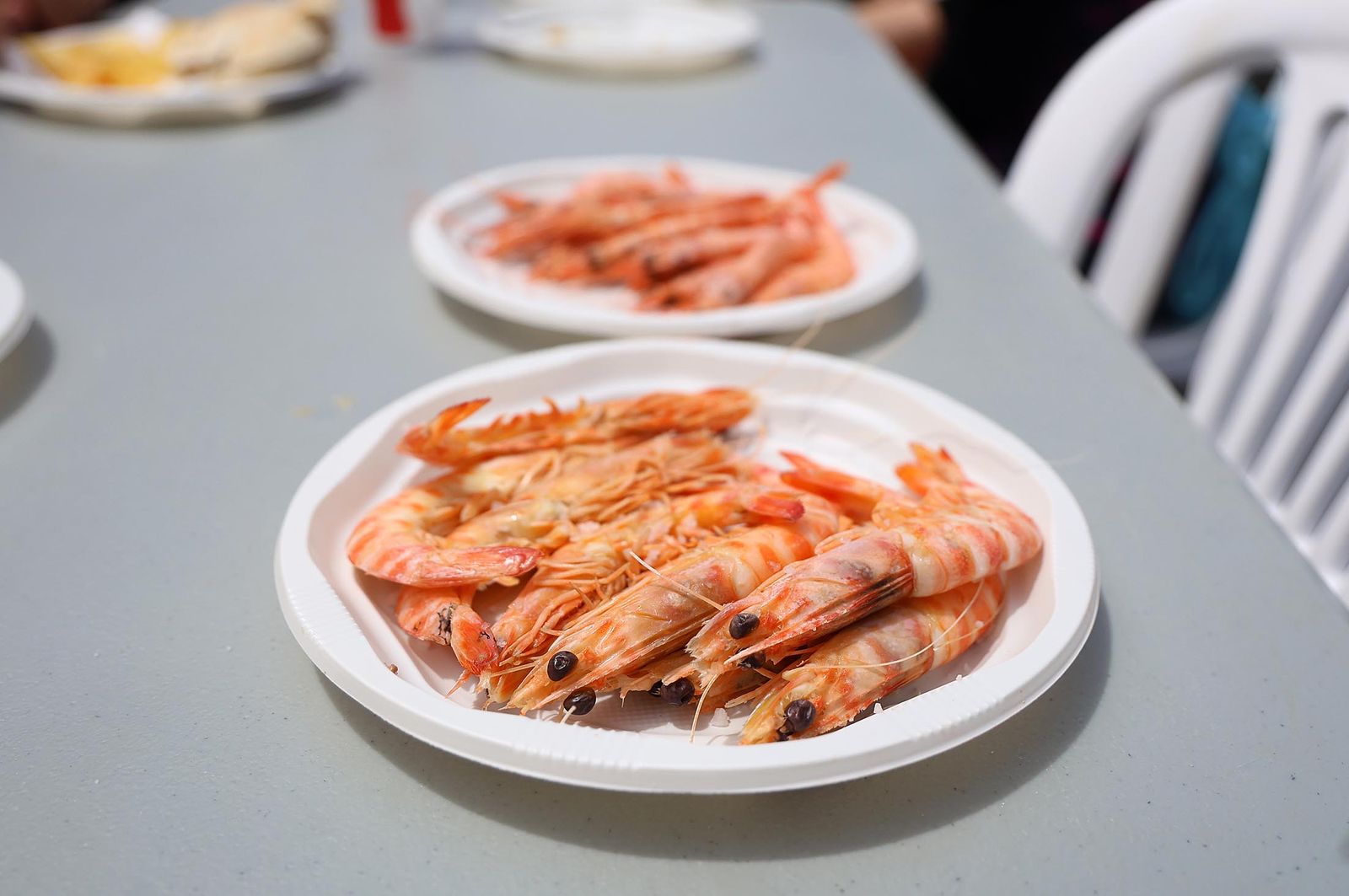 Imágenes del ambiente en la Feria de la Gamba y el Marisco de Huelva