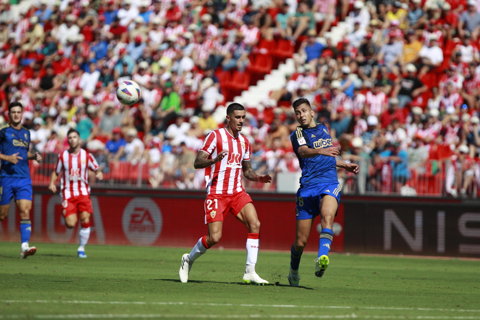 Imágenes del empate a 3 de la U.D. Almería y el Granada C.F.