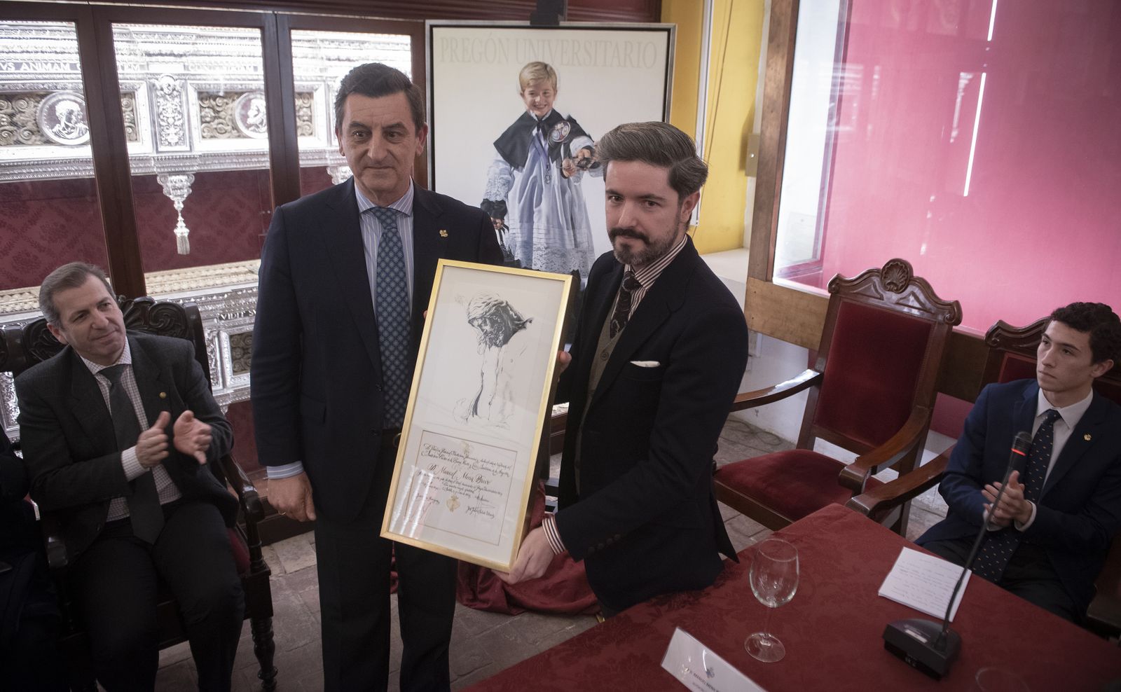 Imágenes de la presentación del cartel universitario de la Hermandad de los Estudiantes