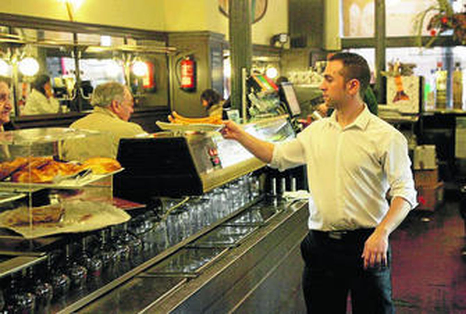 La hostelería y la restauración, uno de los sectores 'refugio' para los trabajadores extranjeros.