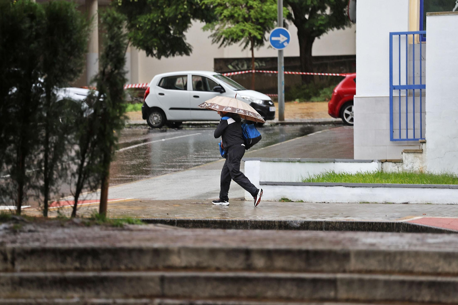 Imágenes de la lluviosa mañana de sábado en Huelva