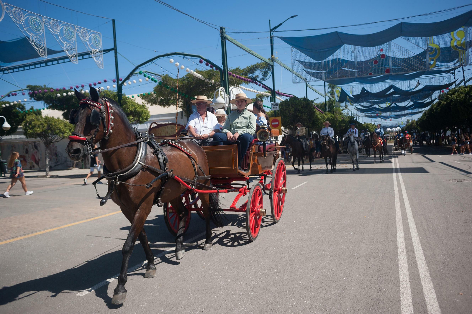 Segundo día de Feria de Málaga en el Centro y en el Real, en fotos