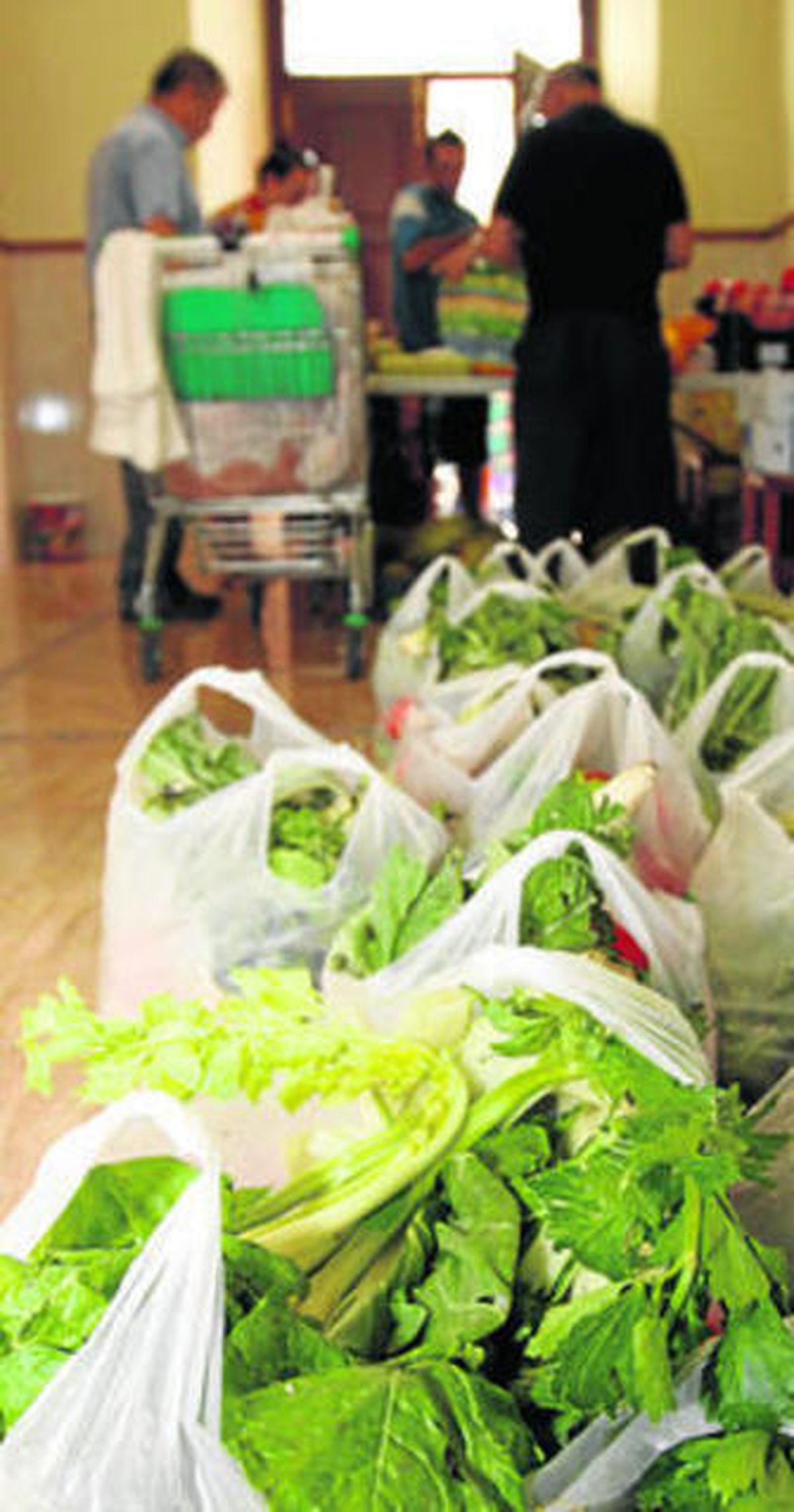 Alimentos preparados para un reparto asistencial.