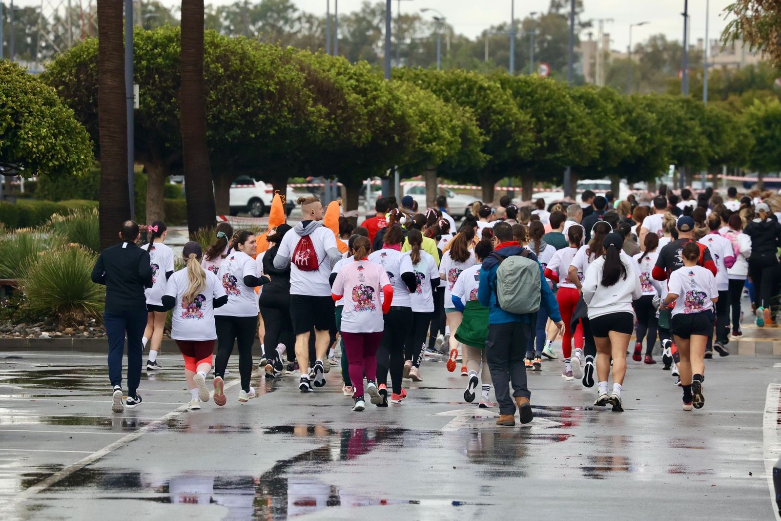 La Carrera por el Día Internacional de la Mujer en Málaga, en fotos