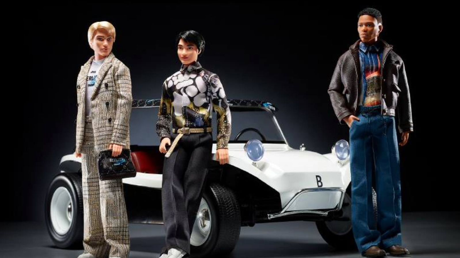 Los tres Ken subastados por 5.500 euros, junto al coche de 'Hot Wheels'.