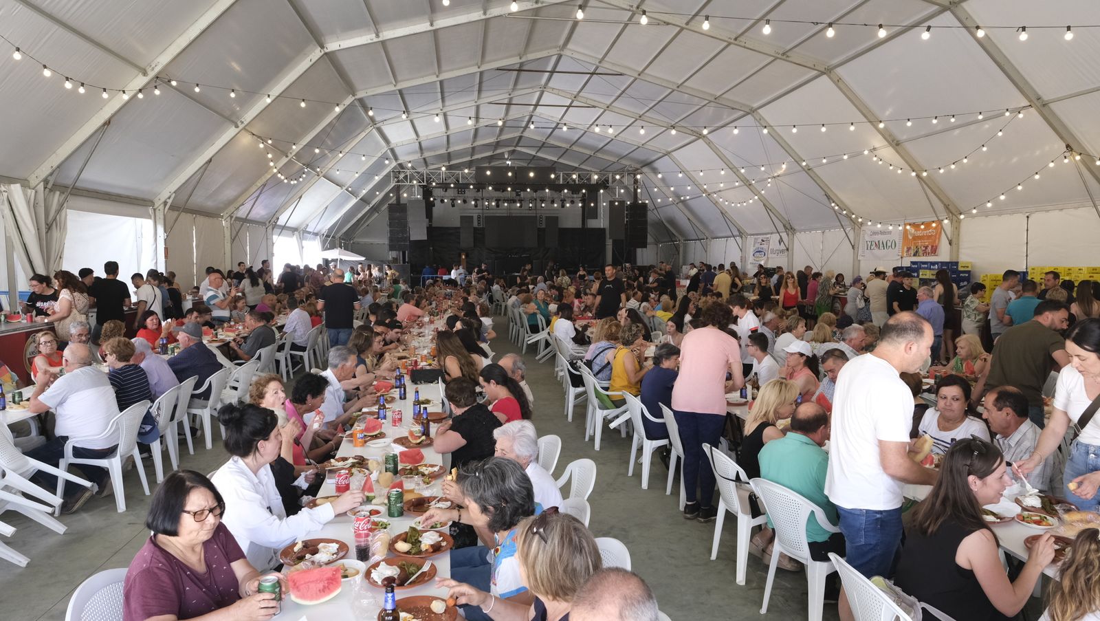 Imágenes de la degustación de huevos fritos con chorizo, en las Fiestas de Santa María del Águila