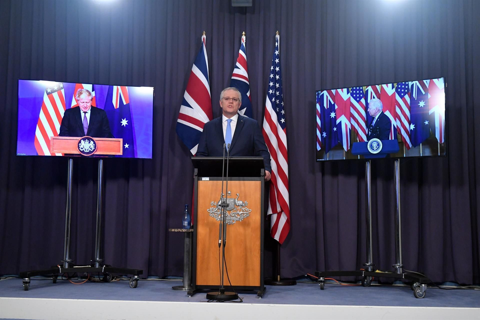 El primer ministro británico, Boris Johnson, el primer ministro de Australia, Scott Morrison , y el presidente de EEUU, Joe Biden, en conferencia de prensa conjunta