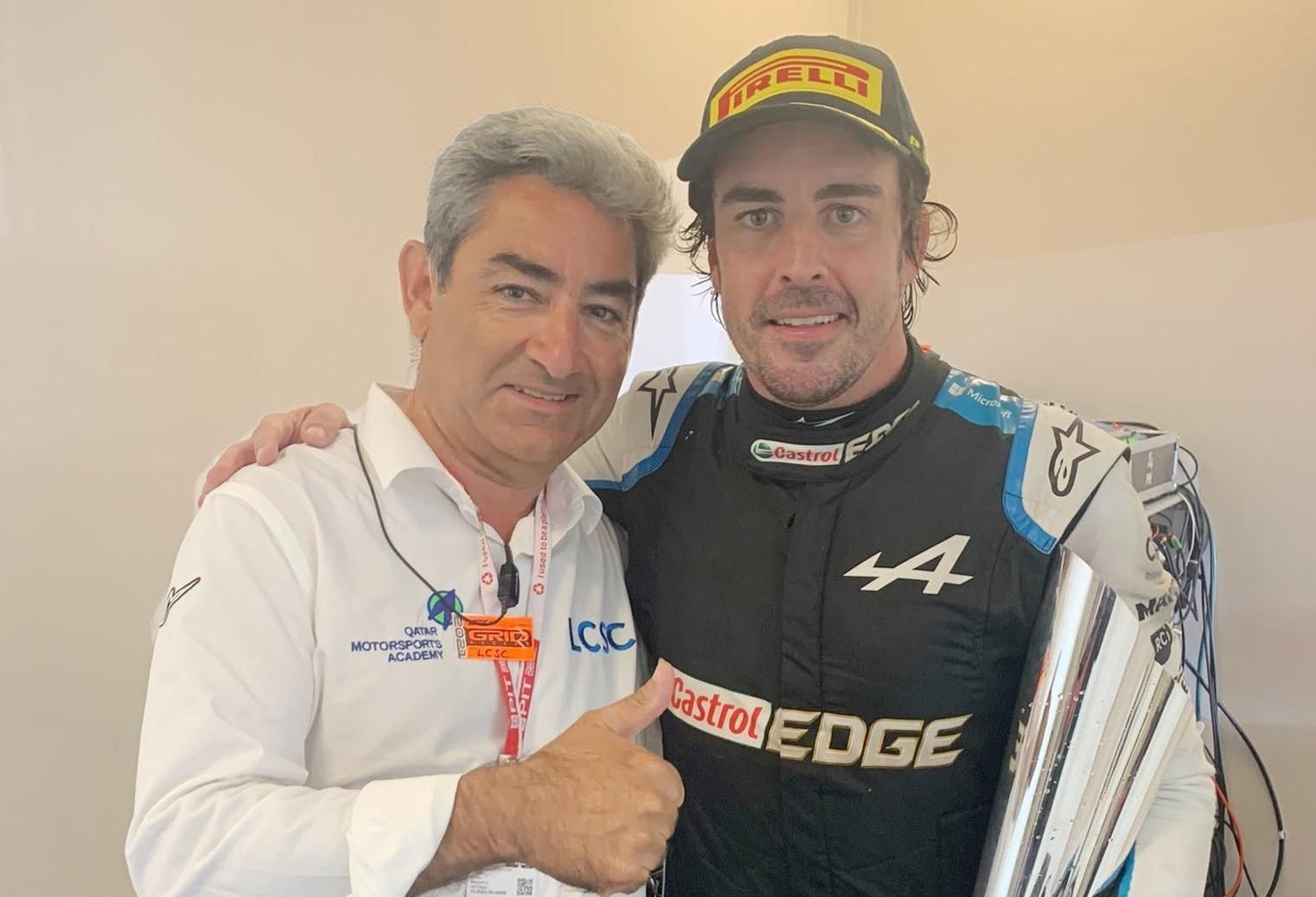Juan Baquero y Fernando Alonso, tras el Gran Premio de Qatar de Fórmula 1.