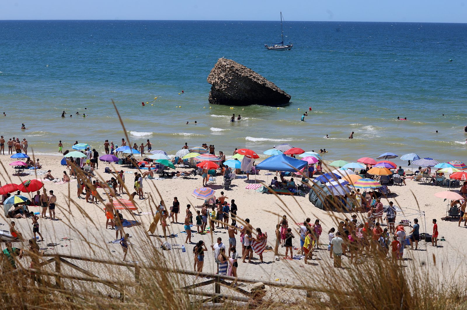 Imágenes de una mañana de calor y playa en Matalascañas