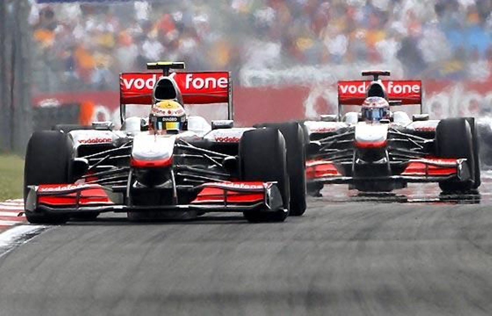 Los pilotos de McLaren Jenson Button y Lewis Hamilton, segundo y primero en el Gran Premio de Turquía.

Foto: Reuters / Afp Photo / Efe