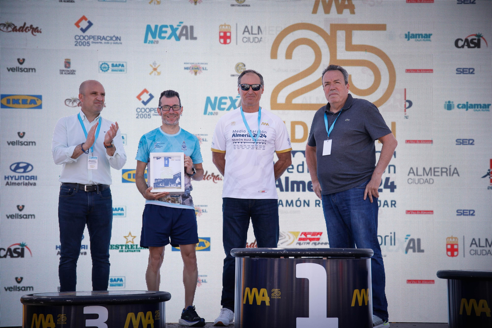 Imágenes de los premiados en la Media maratón de la Cuidad de Almería