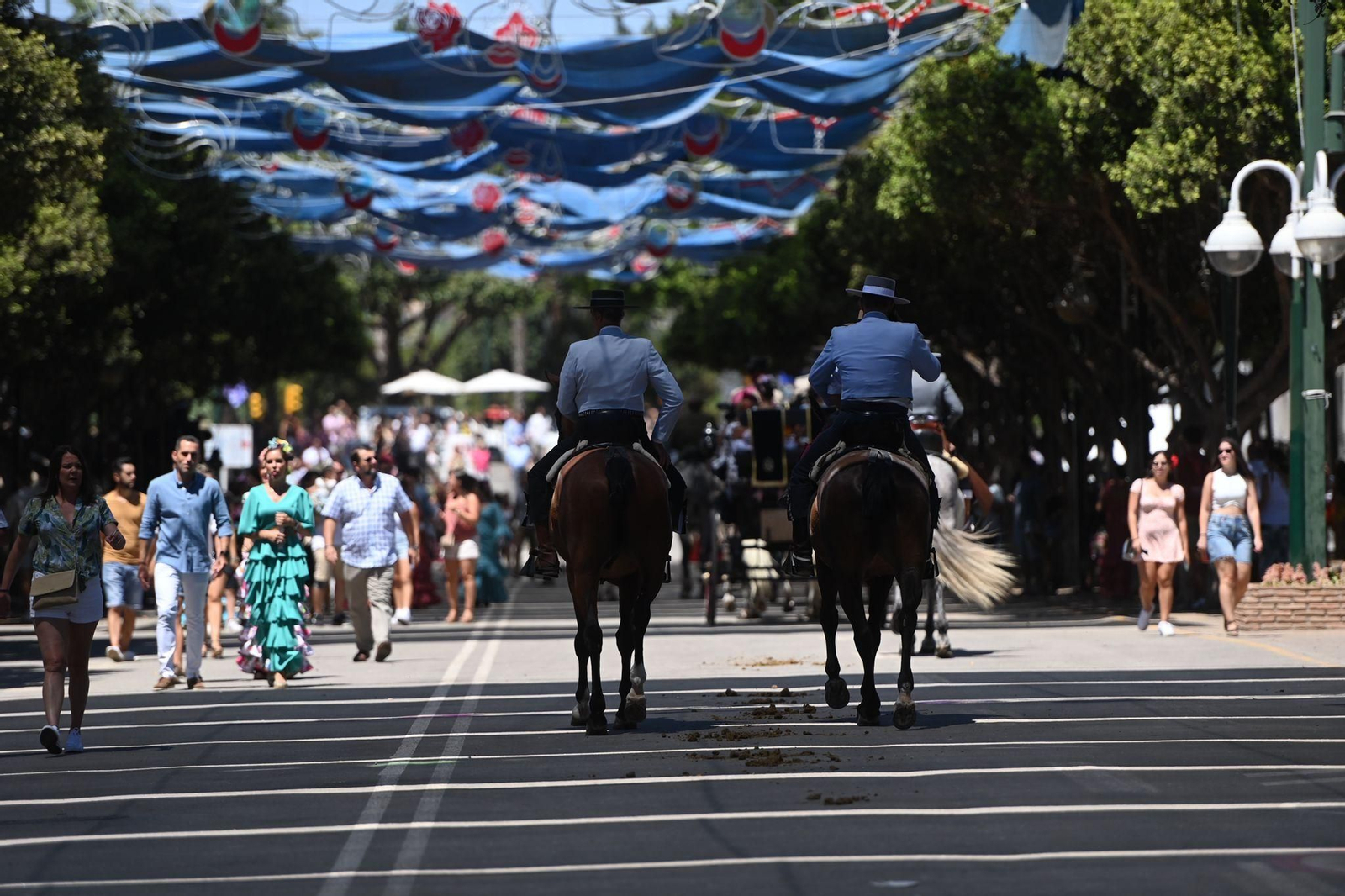 Las fotos del lunes festivo en la Feria en Málaga