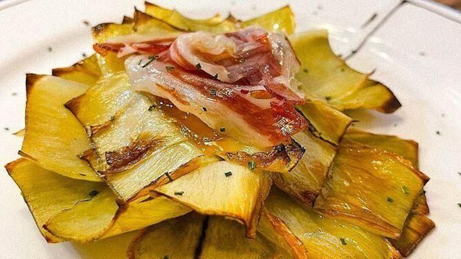 Alcachofas con jamón del restaurante La Revoleá.