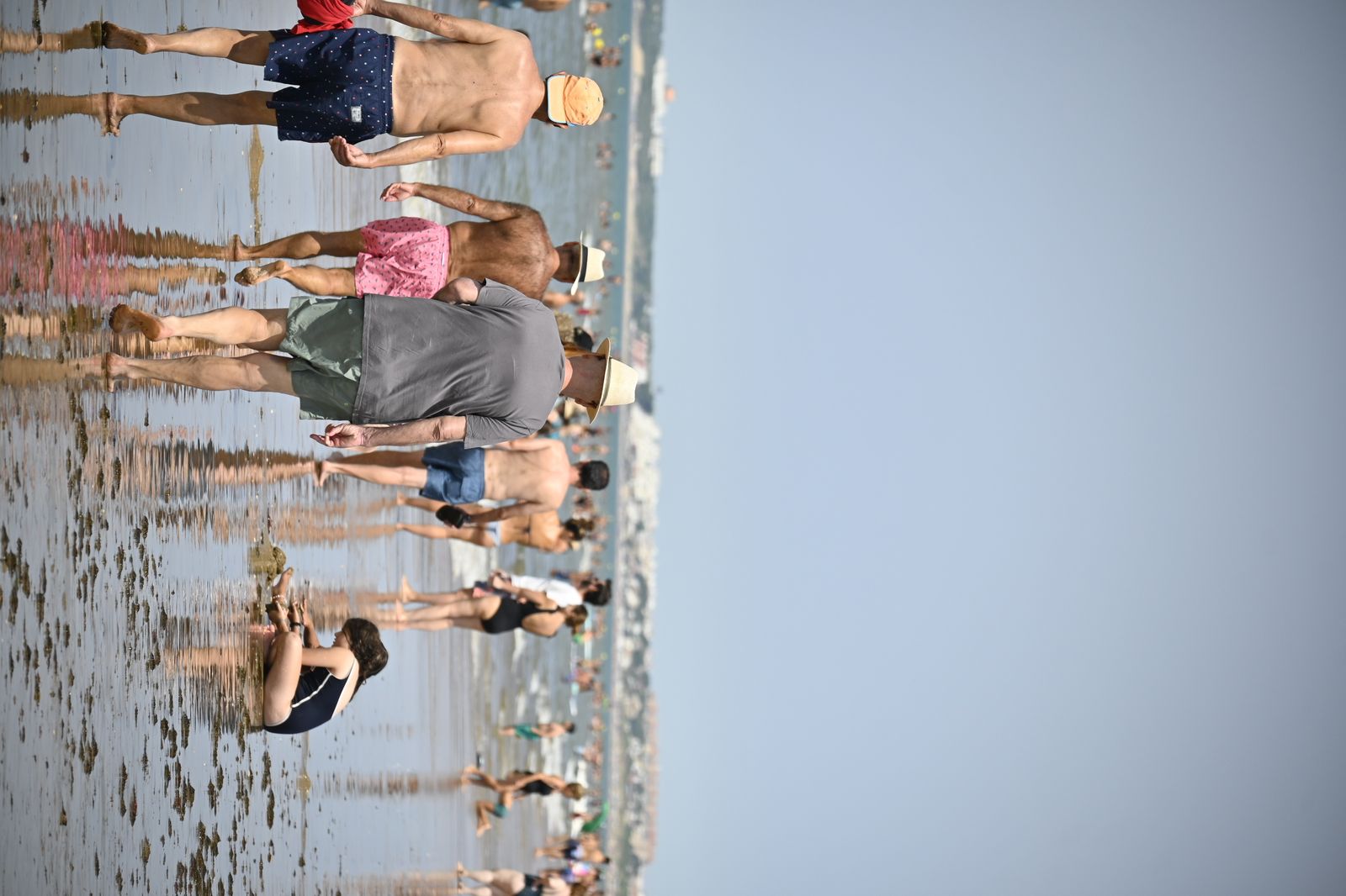 Ambiente en la playas de Huelva este sábado 22 de julio, en imágenes