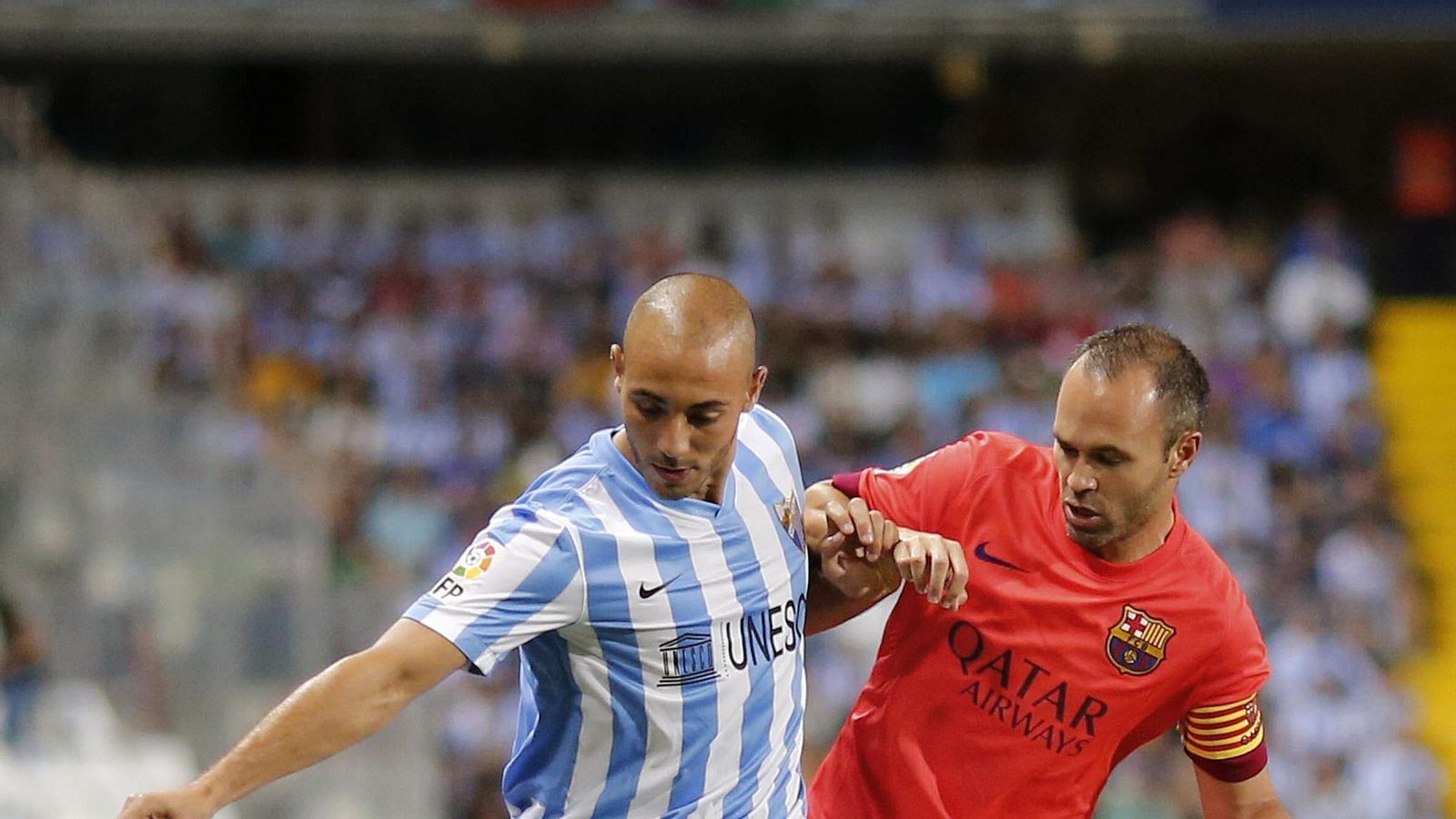 Las fotos de Andrés Iniesta en La Rosaleda con España y el Barcelona Las fotos de Andrés Iniesta en La Rosaleda con España y el Barcelona