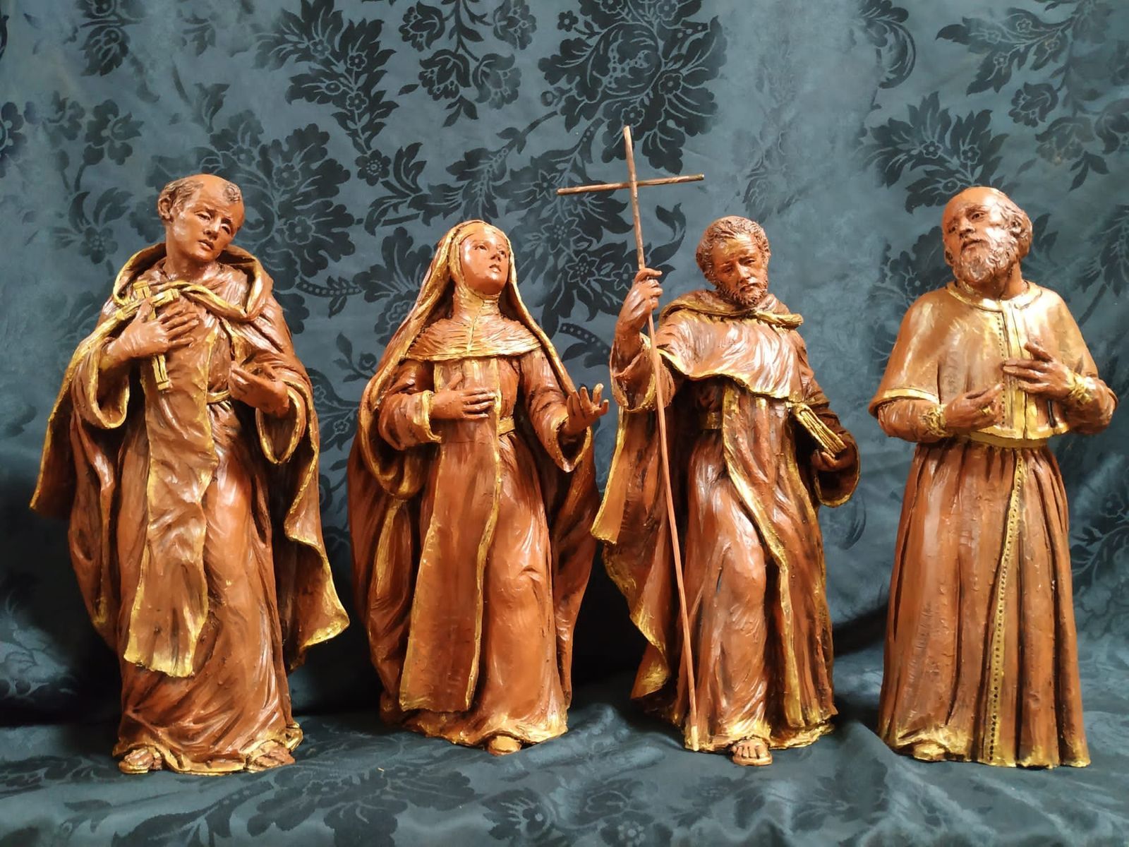 Las cuatro figuras que acompañarán al Cristo del Amor.