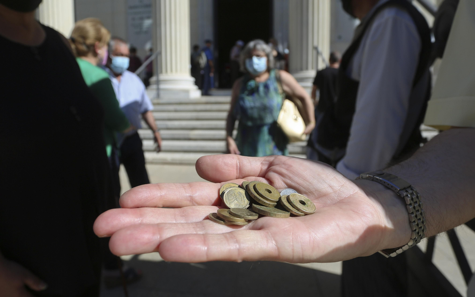 El último día de vida de las pesetas, en fotos