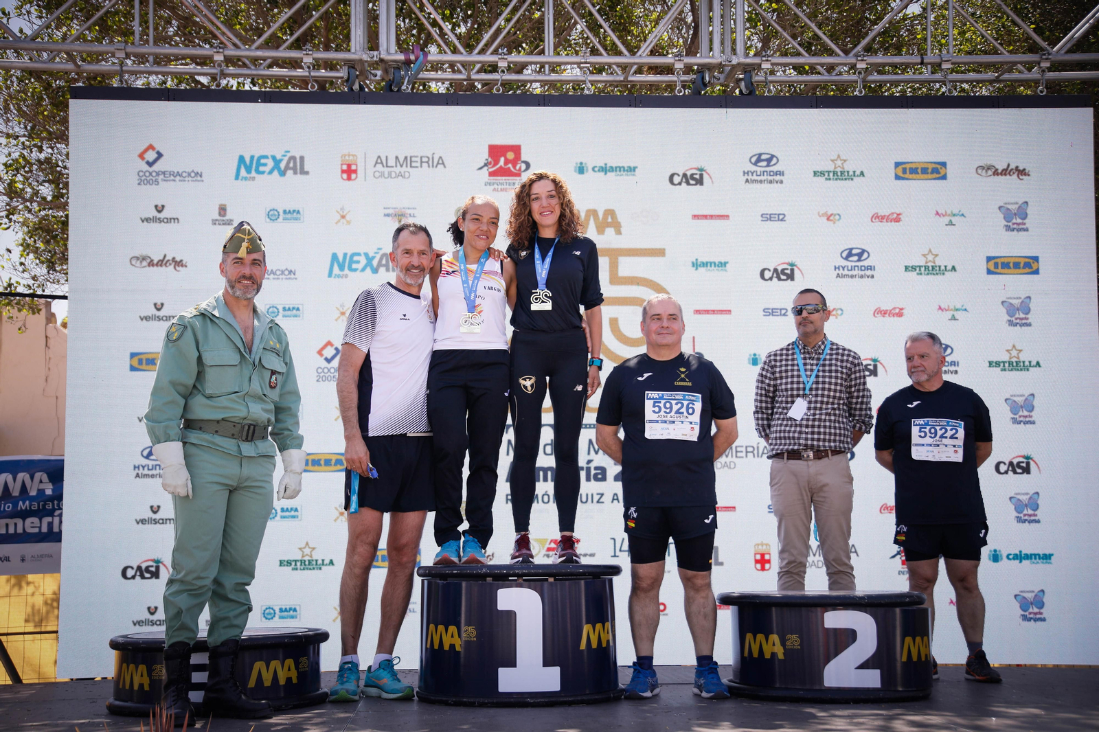 Imágenes de los premiados en la Media maratón de la Cuidad de Almería