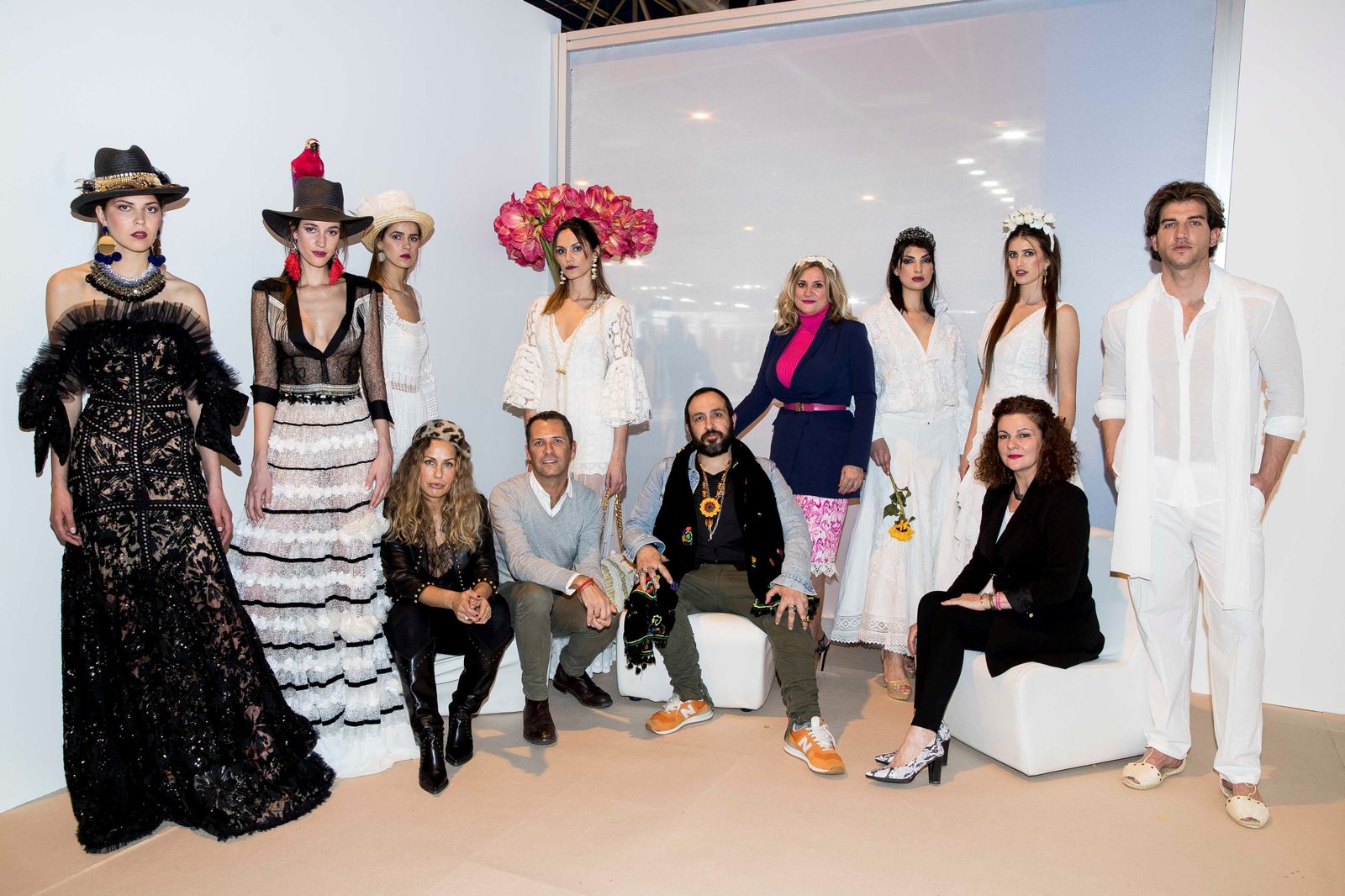 Los catro diseñadores de 'Adlib Moda Ibiza', con algunos de sus modelos.