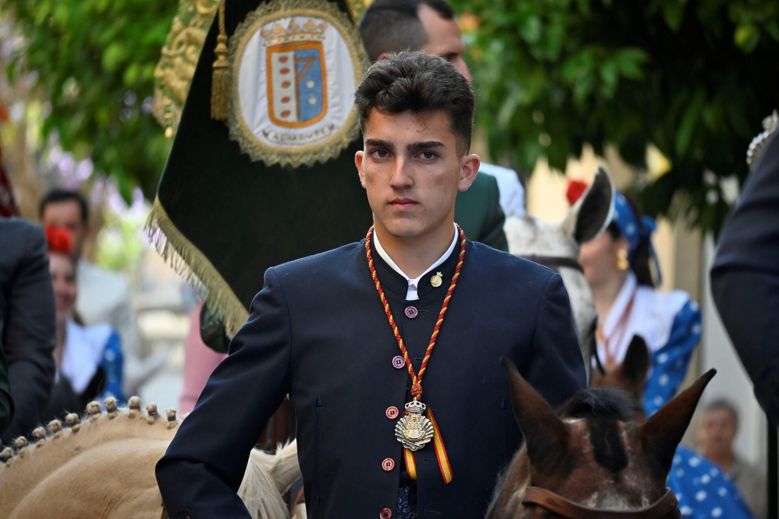 Imágenes de los peregrinos de la Hermandad de Emigrantes en su salida por las calles de Huelva