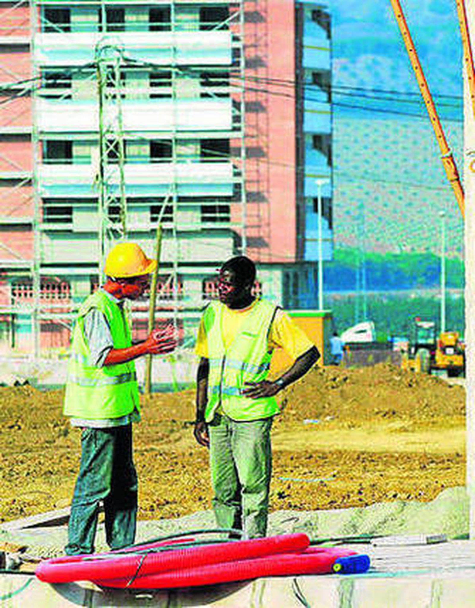 Dos trabajadores inmigrantes.