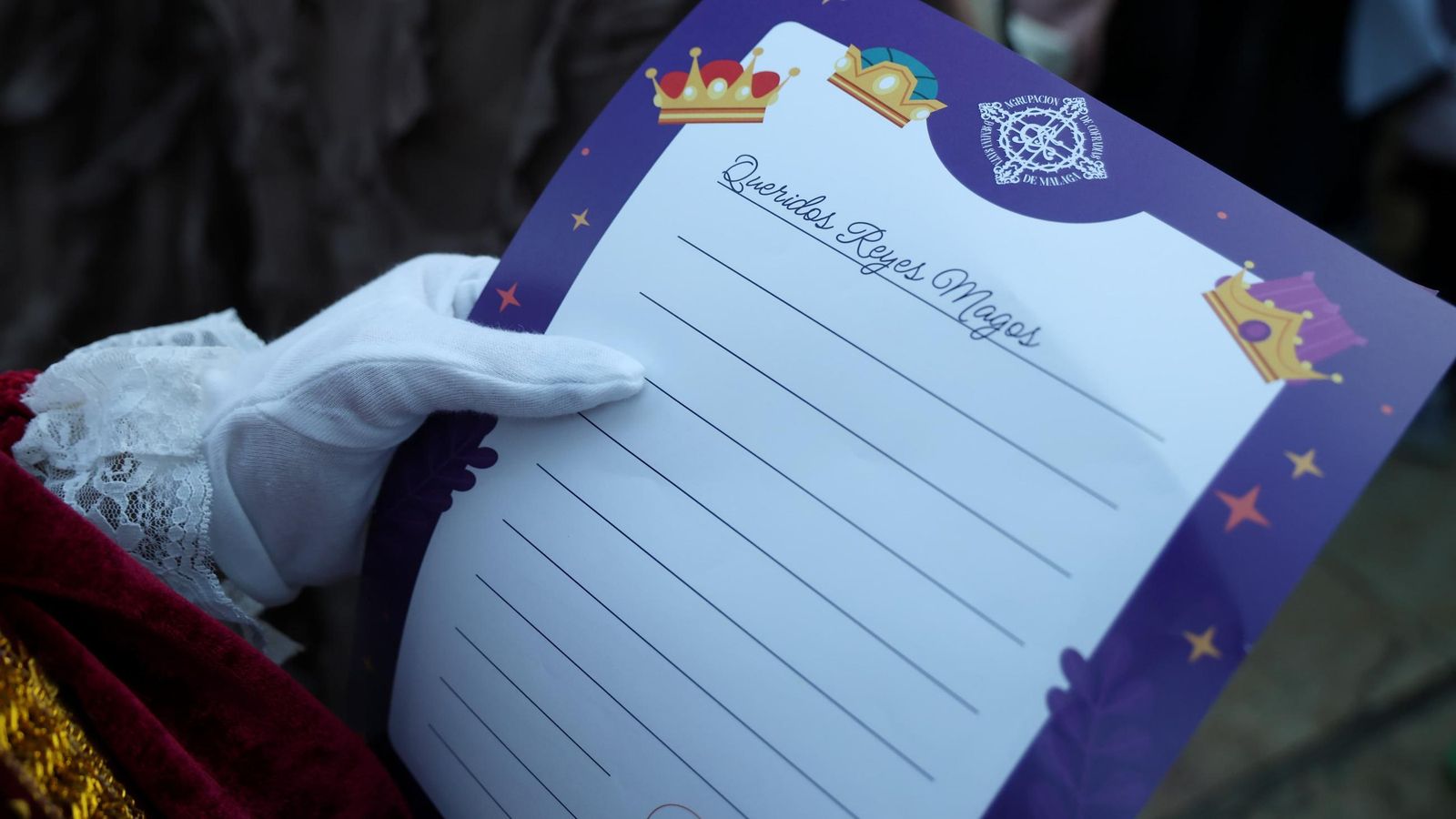 Carta de los Reyes Magos repartida a los niños durante el trayecto del Heraldo