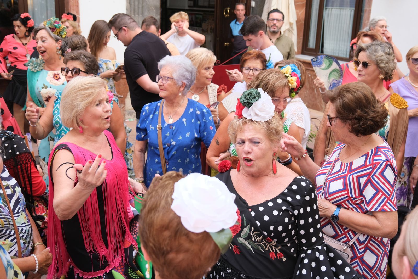 La celebración en Cabra del Día de la Mujer con motivo de la Real Feria, en imágenes