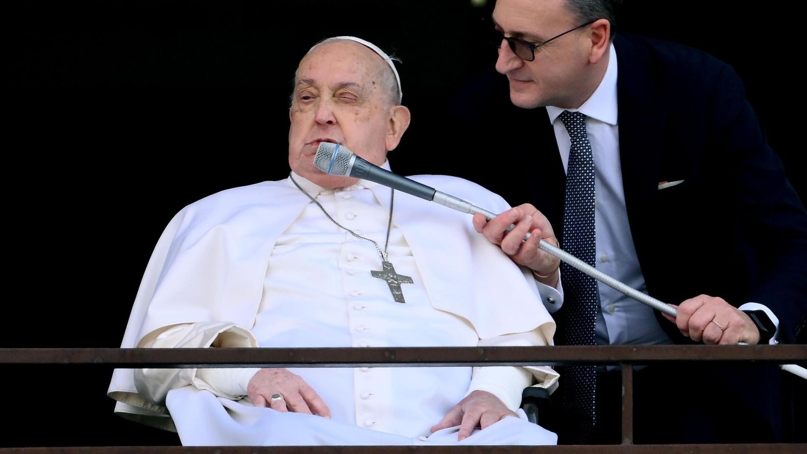 Pope Francis blesses the faithful from the balcony of the Gemelli hospital