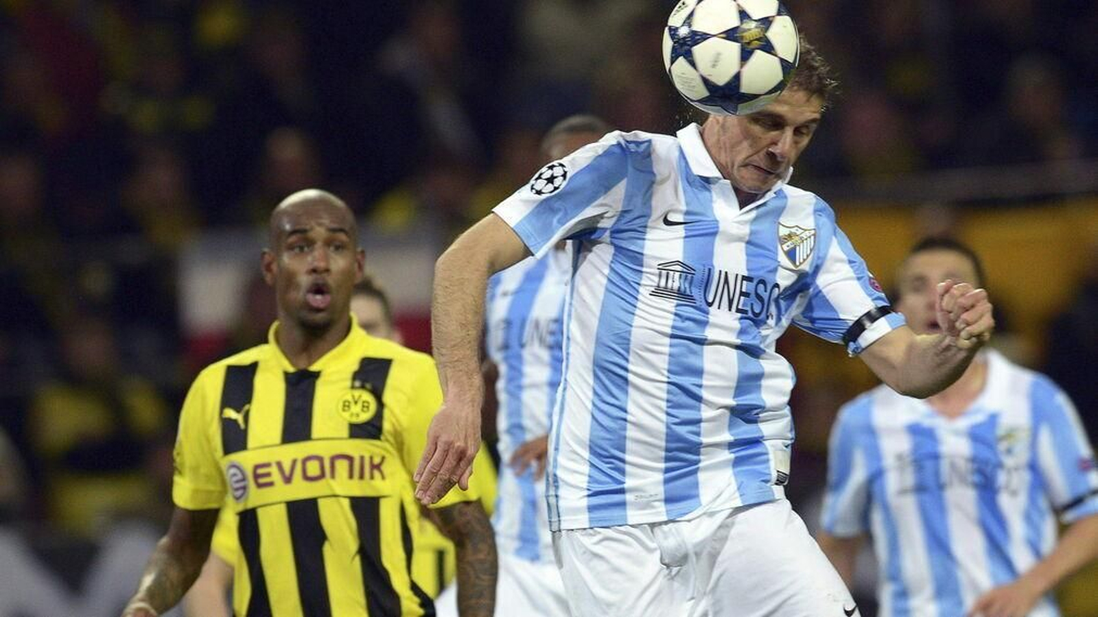 Las imágenes del Borussia Dortmund-Málaga, que cumple siete años.