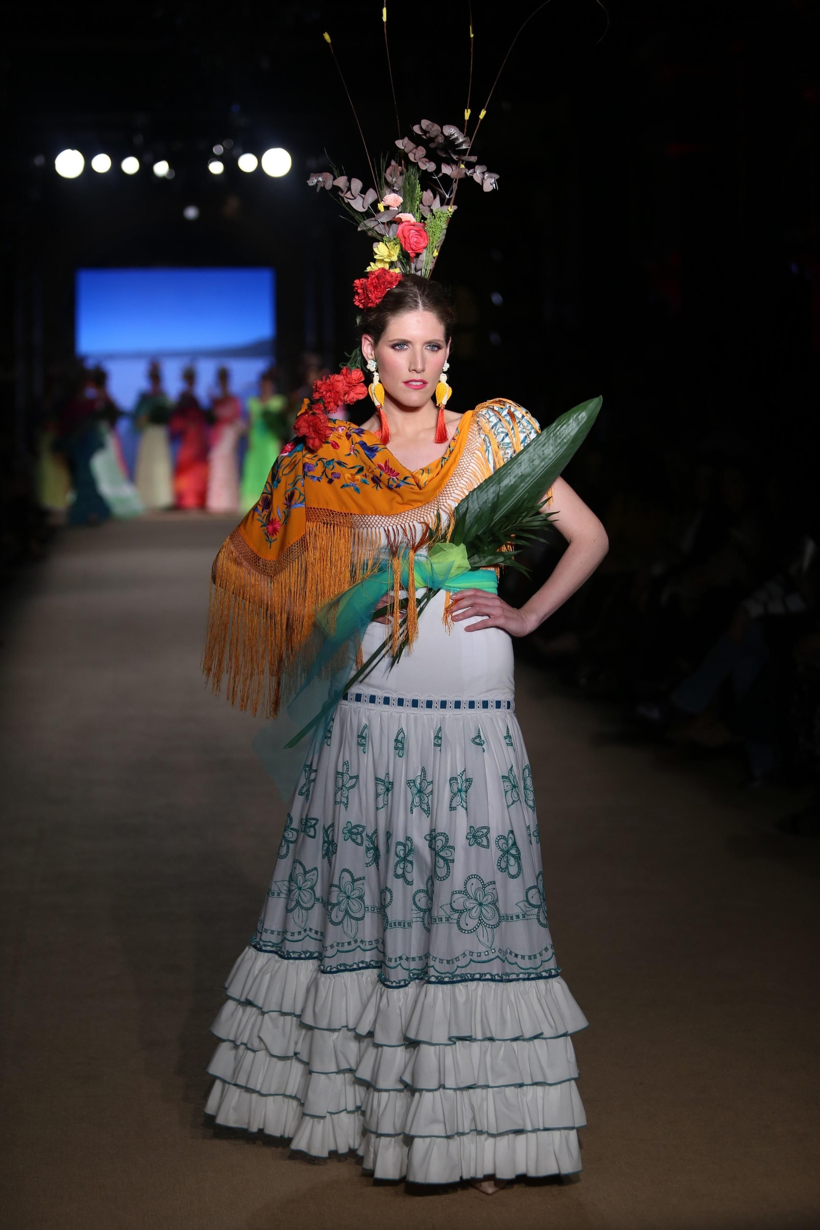 El traje de flamenca blanco y sus versiones más bonitas de esta temporada