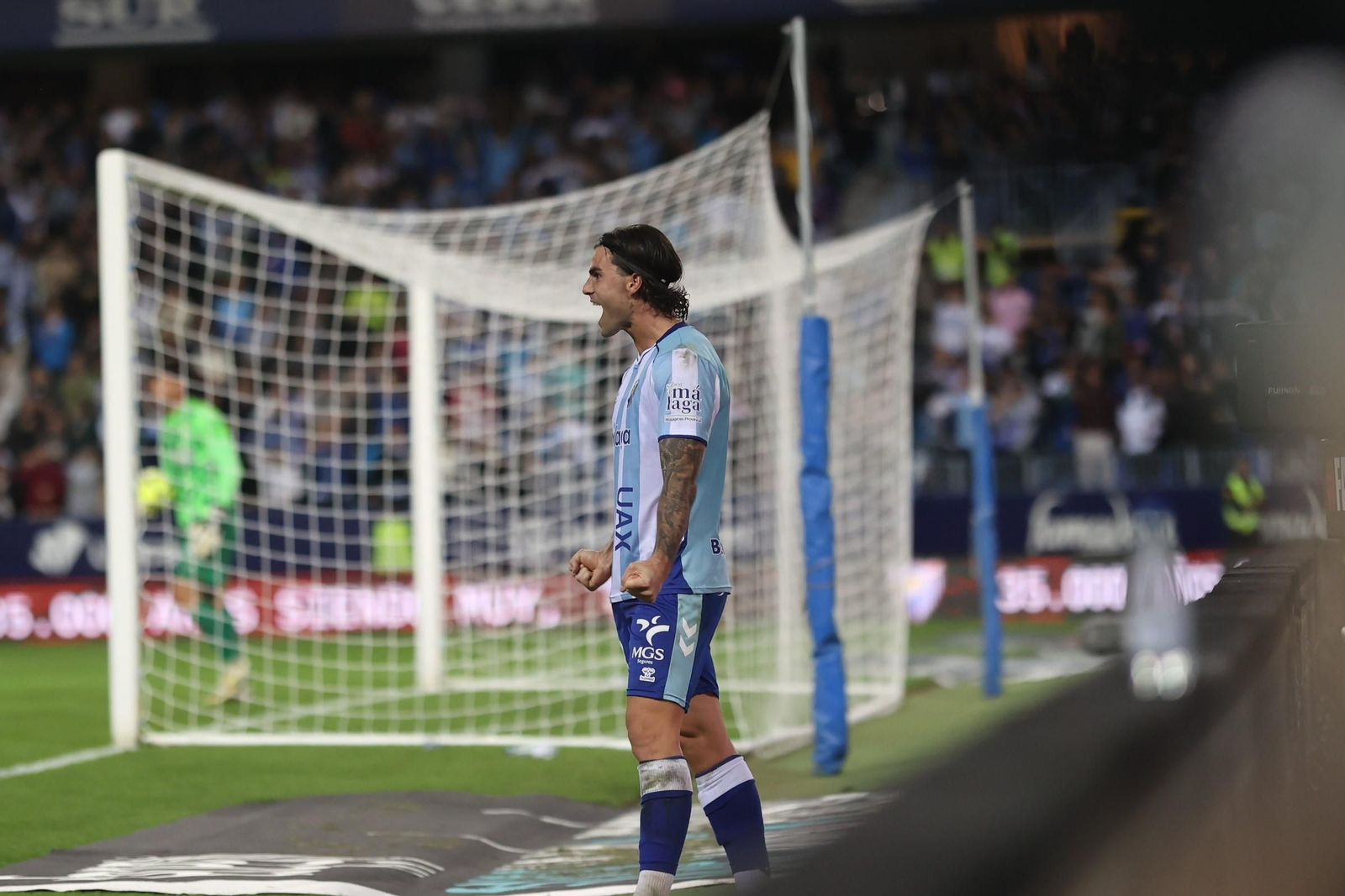 Las fotos del imponente ambiente en La Rosaleda en el Málaga - Córdoba CF