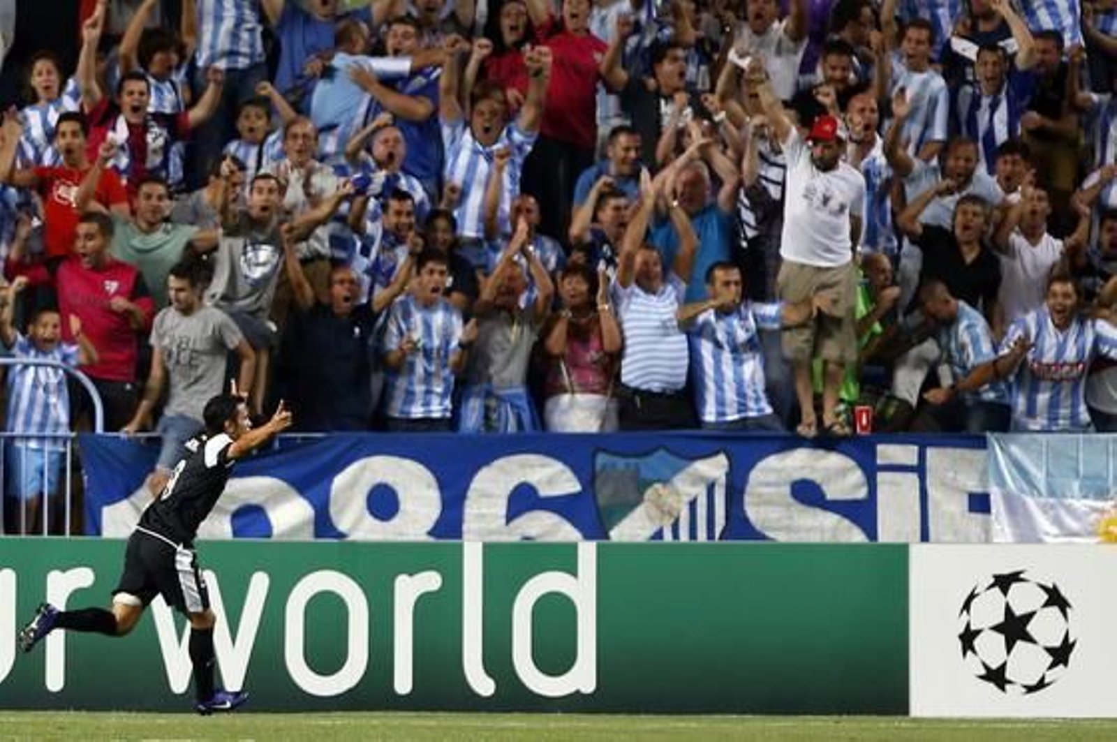 El estreno soñado del Málaga en la Champions, en fotos 

Foto: EFE