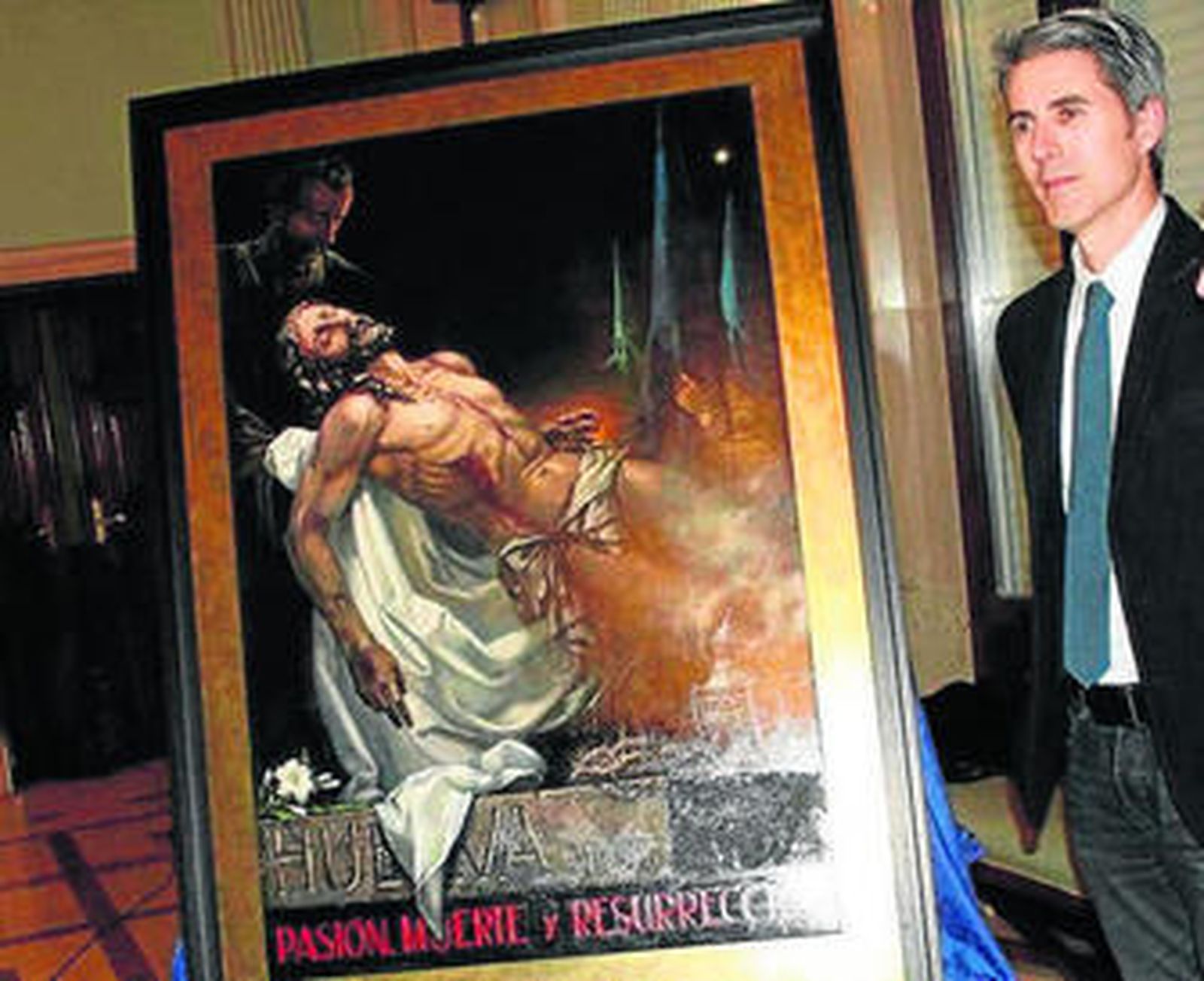 Mario Moya junto al cartel de la Semana Santa.