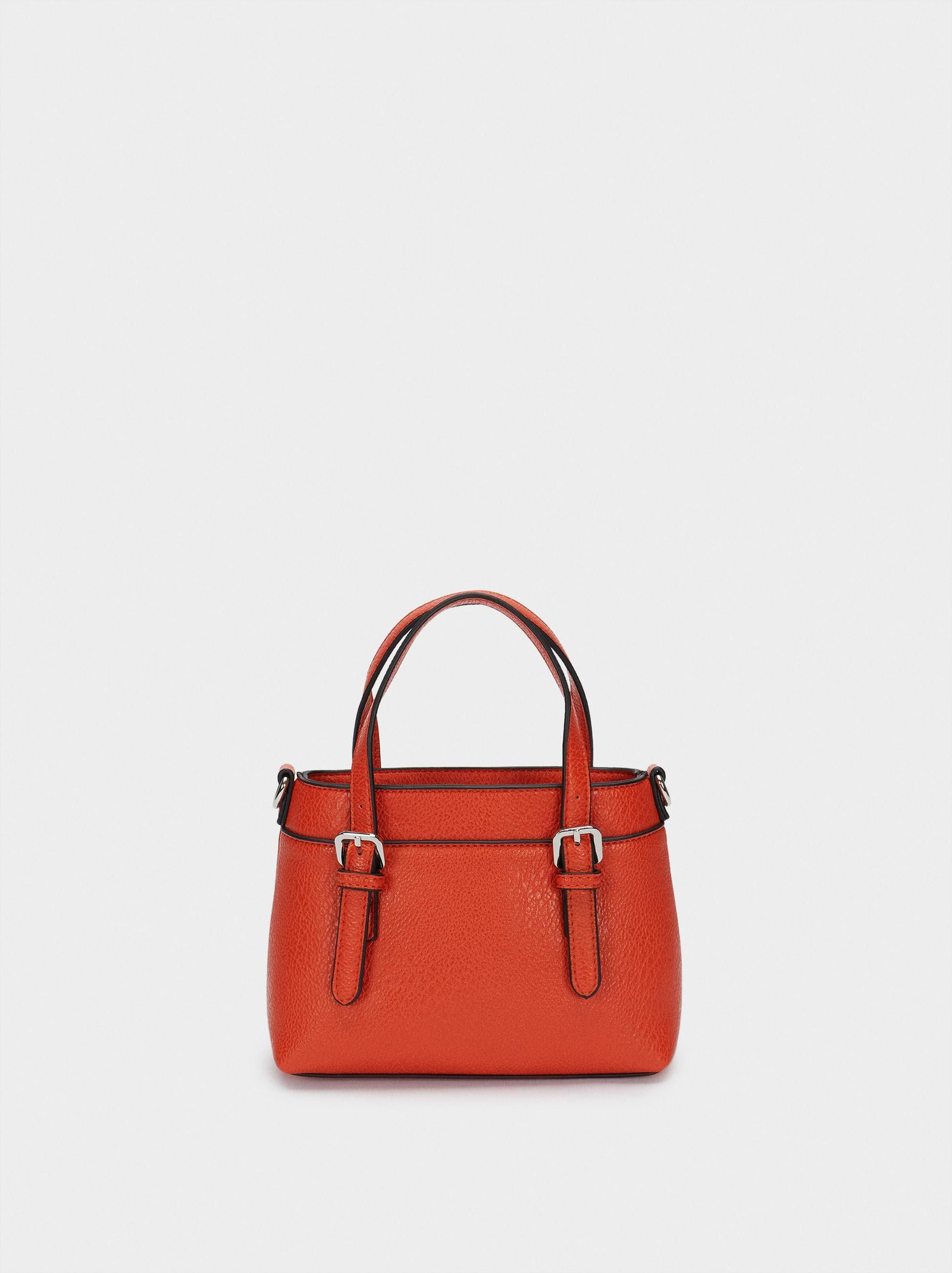 Bolso mini de color naranja de Parfois.