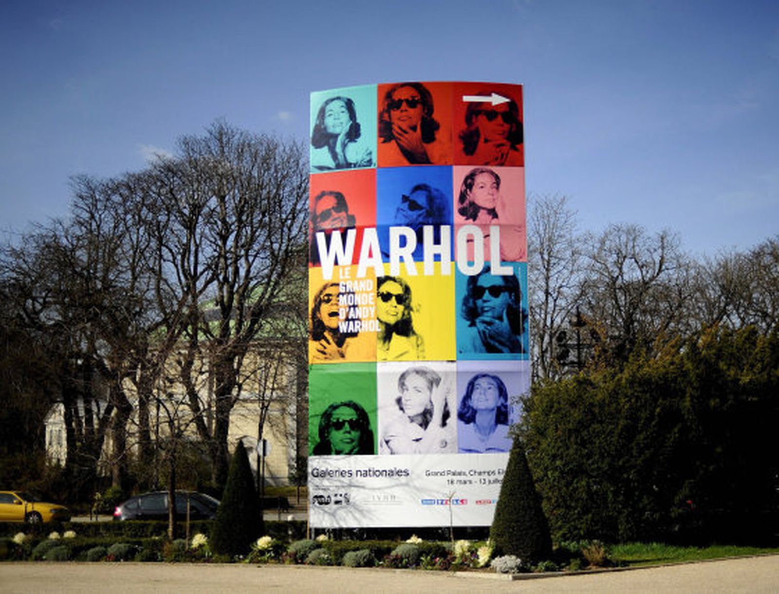 Cartel que preside la entrada a la exposición 'Warhol's Wide World'  Foto: EFE