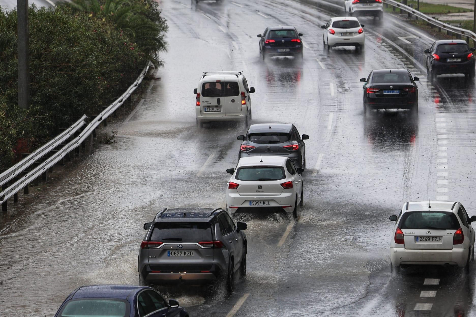 El tráfico en Málaga tras las lluvias, en fotos