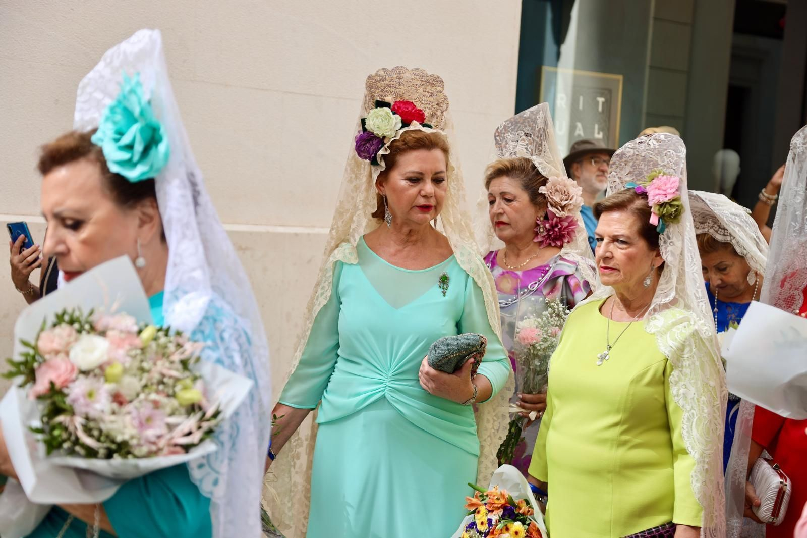La misa estacional y el pasacalles previo a la procesión de la Victoria en Málaga, en imágenes