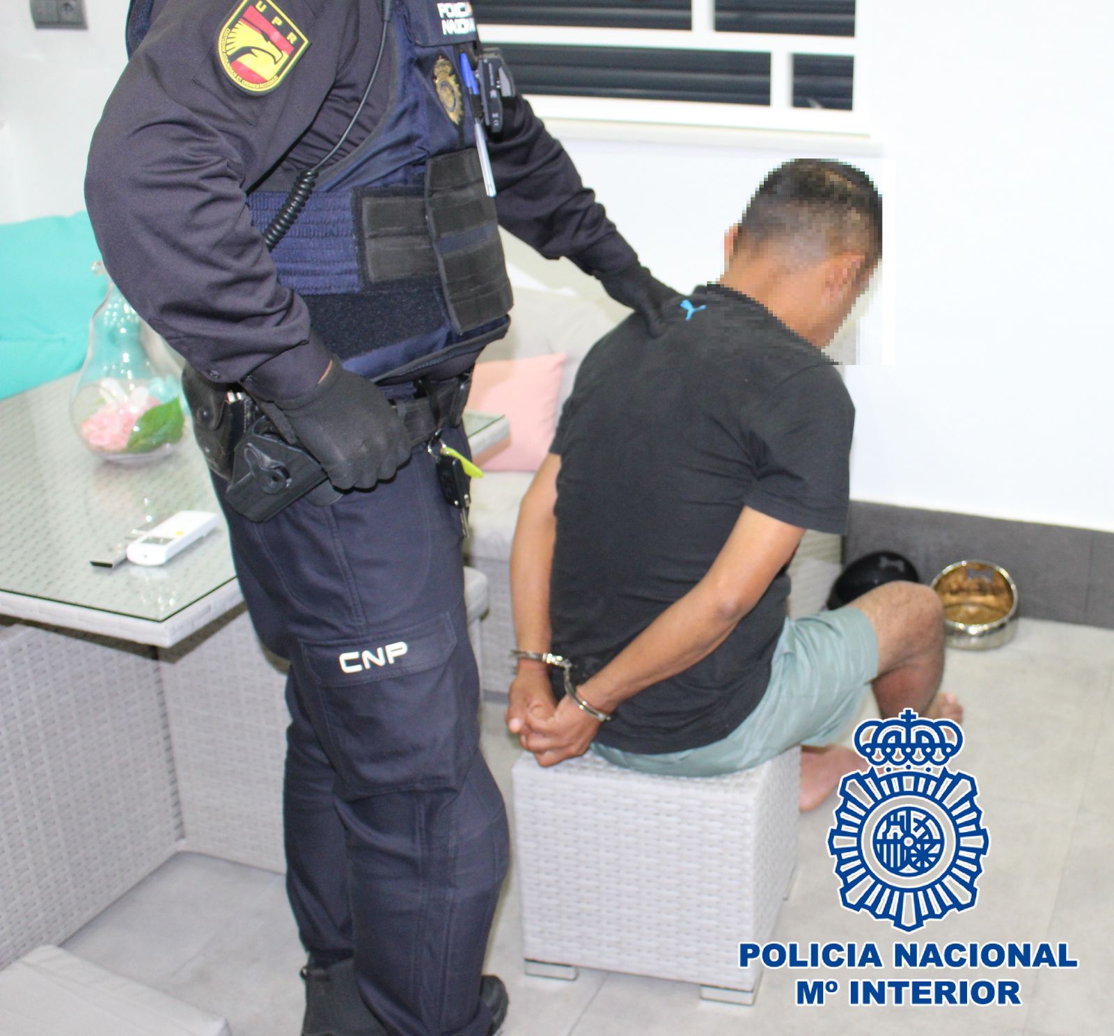 Uno de los detenidos por la Policía.