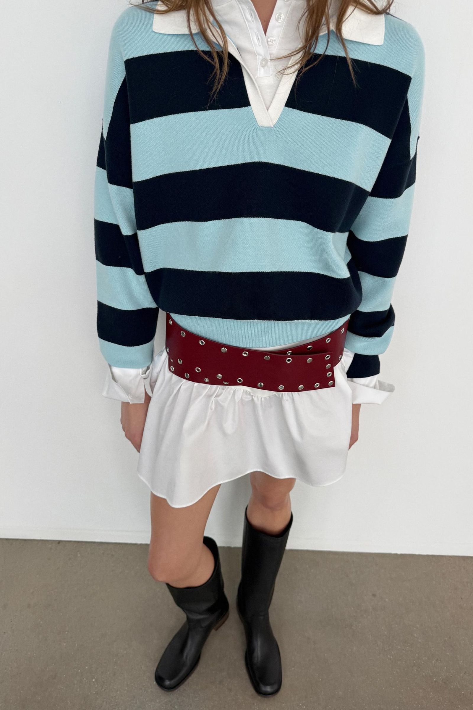 Jersey tipo polera de rayas de Zara.