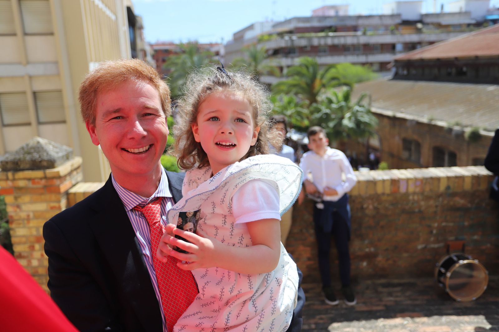 Imágenes del recorrido de la Borriquita  por las calles de Huelva