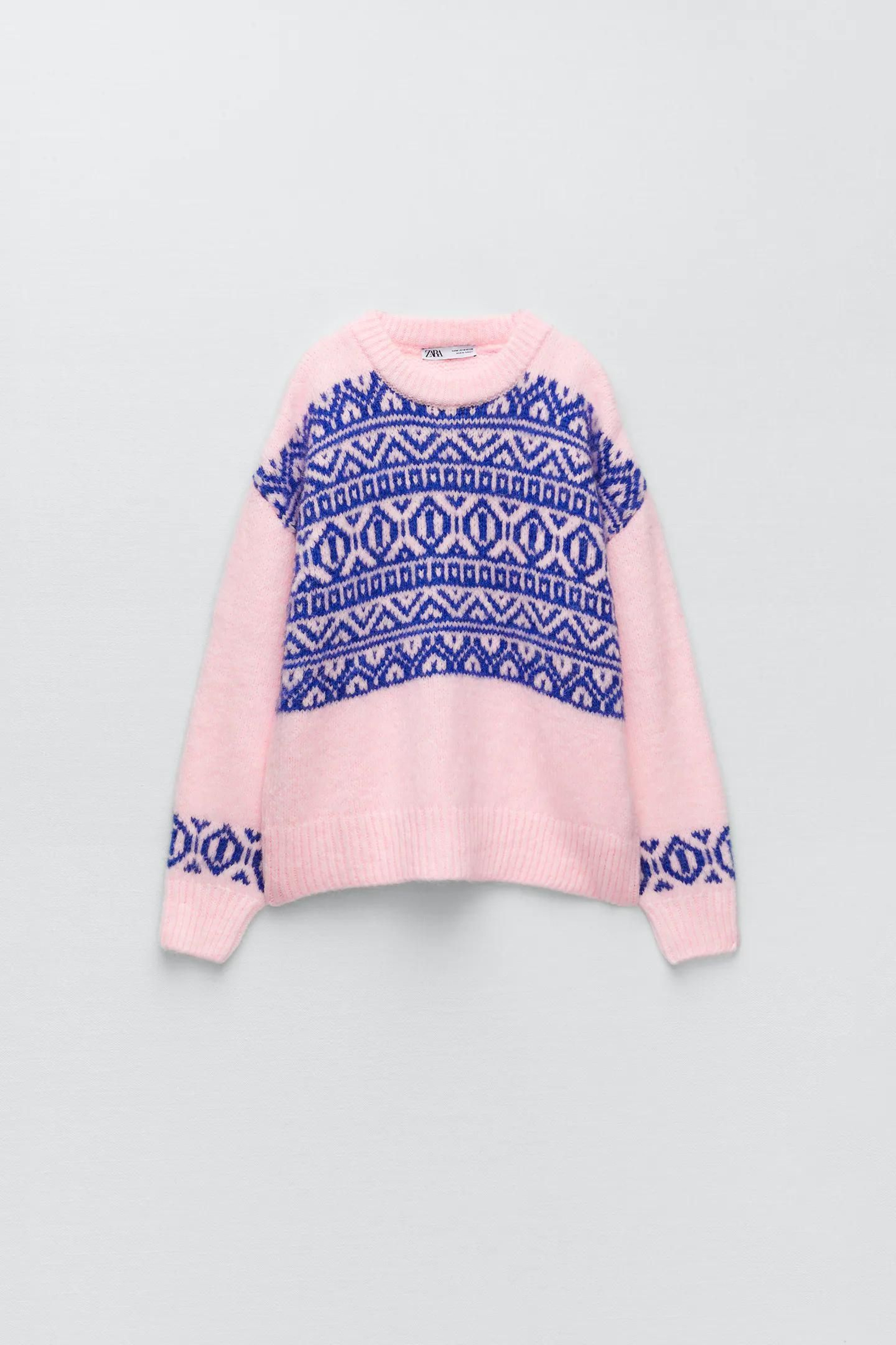 Jersey rosa con cenefa azul de Zara.