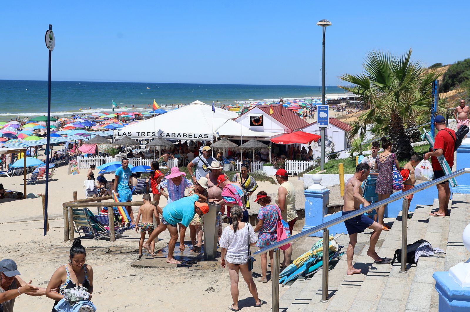 Imágenes de una mañana de calor y playa en Matalascañas