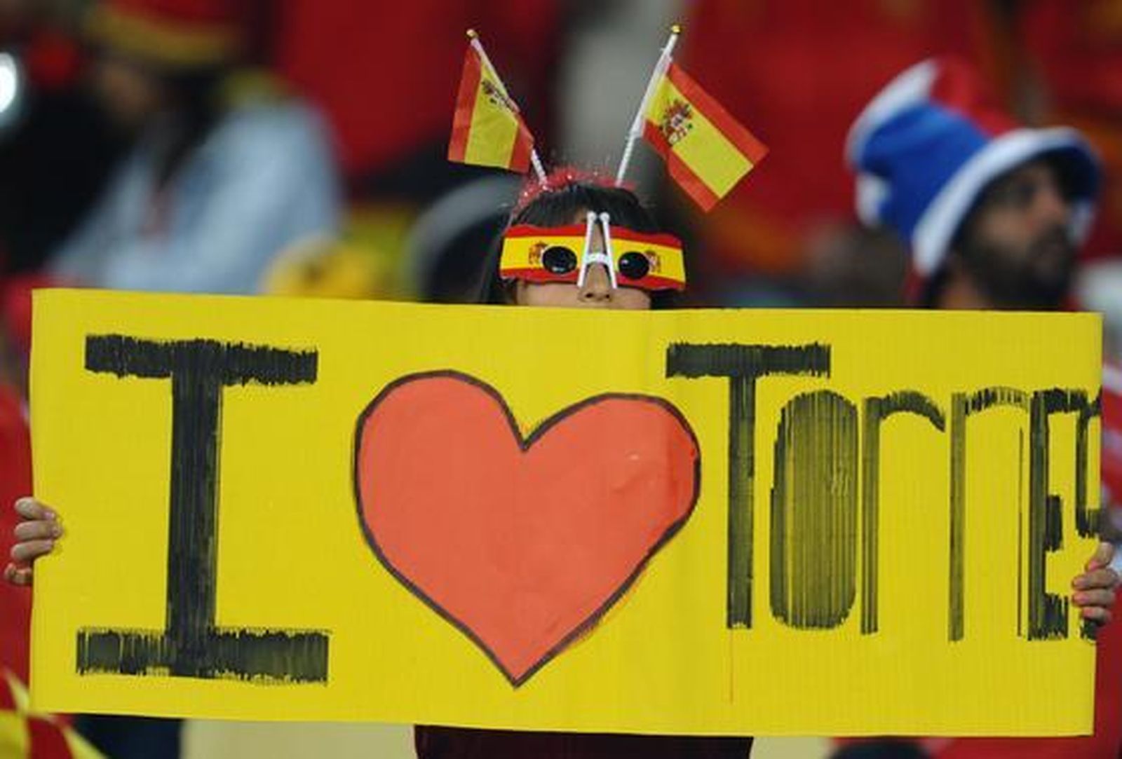 Una fan de Fernando Torres en el estadio de Pretoria. / Reportaje gráfico: EFE, Reuters, AFP.