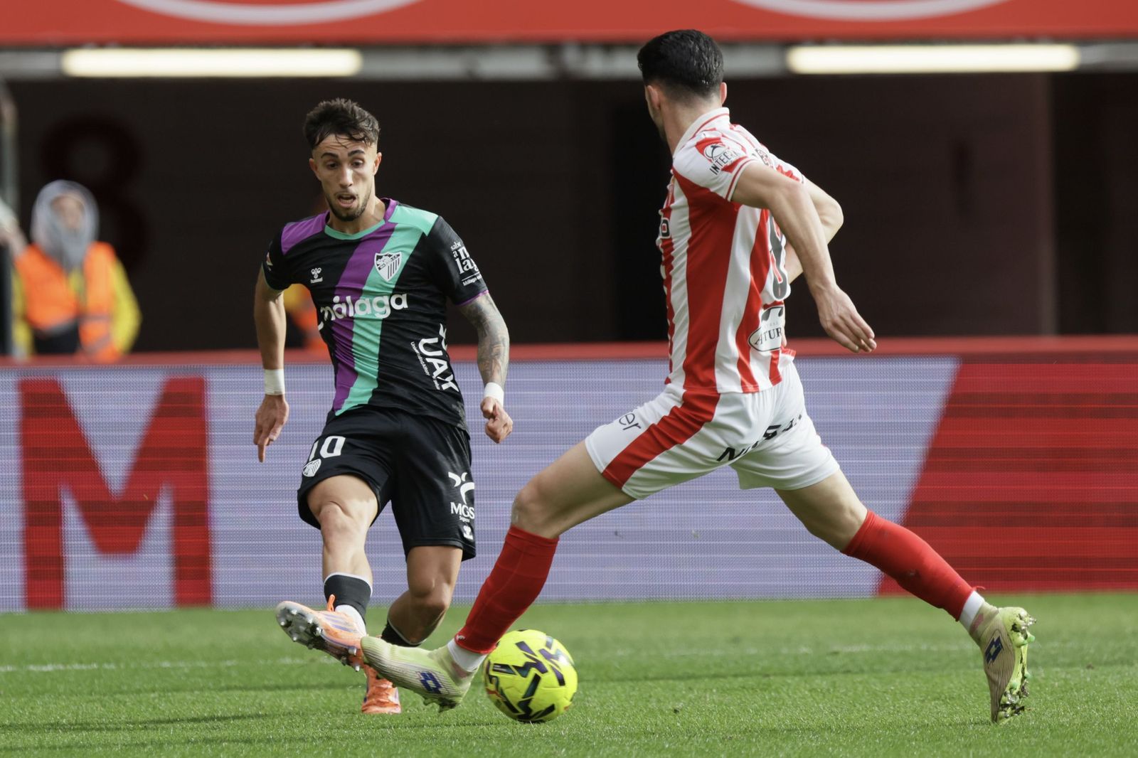El Sporting-Málaga CF, en fotos