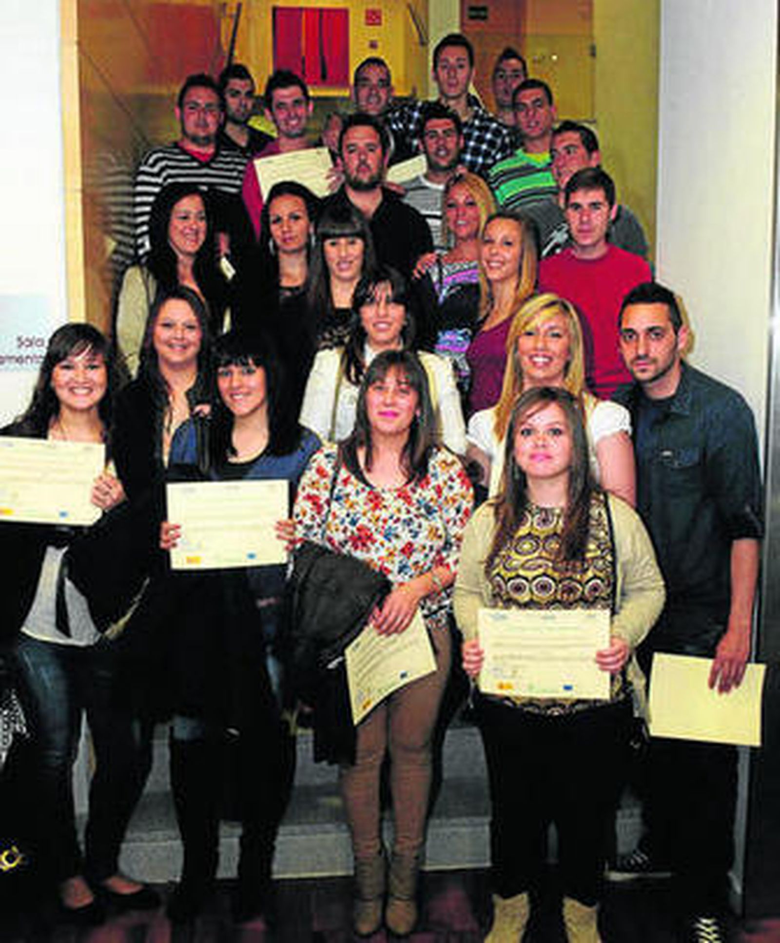 Alumnos de la escuela taller Trisla, tras el acto de clausura.