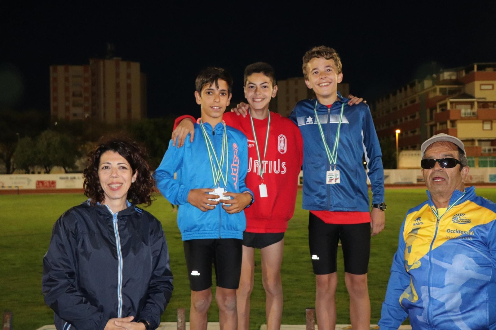 Podio de la categoría infantil masculina en la prueba de 1.000 metros.