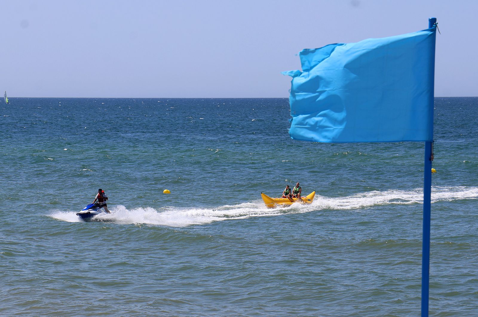 Imágenes de una mañana de calor y playa en Matalascañas